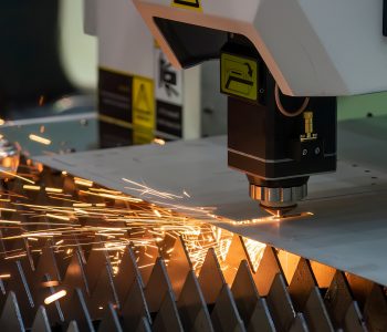 Close-up scene the fiber laser cutting machine cutting machine cut the metal plate. Close-up scene the fiber laser cutting machine cutting machine cut the metal plate. The hi-technology sheet metal manufacturing process by laser cutting machine.